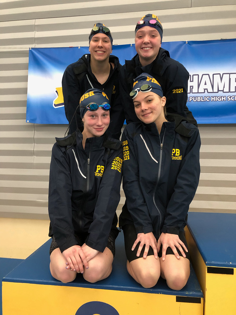 Pine Bush’s 400-meter relay team of clockwise from top: Elishka Hajek, Katie Webster, Mackenzie Gula and Madaghan O’Shea finished second in the NYSPHSAA and third in the state Federation at the New York State girls’ swimming championships at Ithaca College.